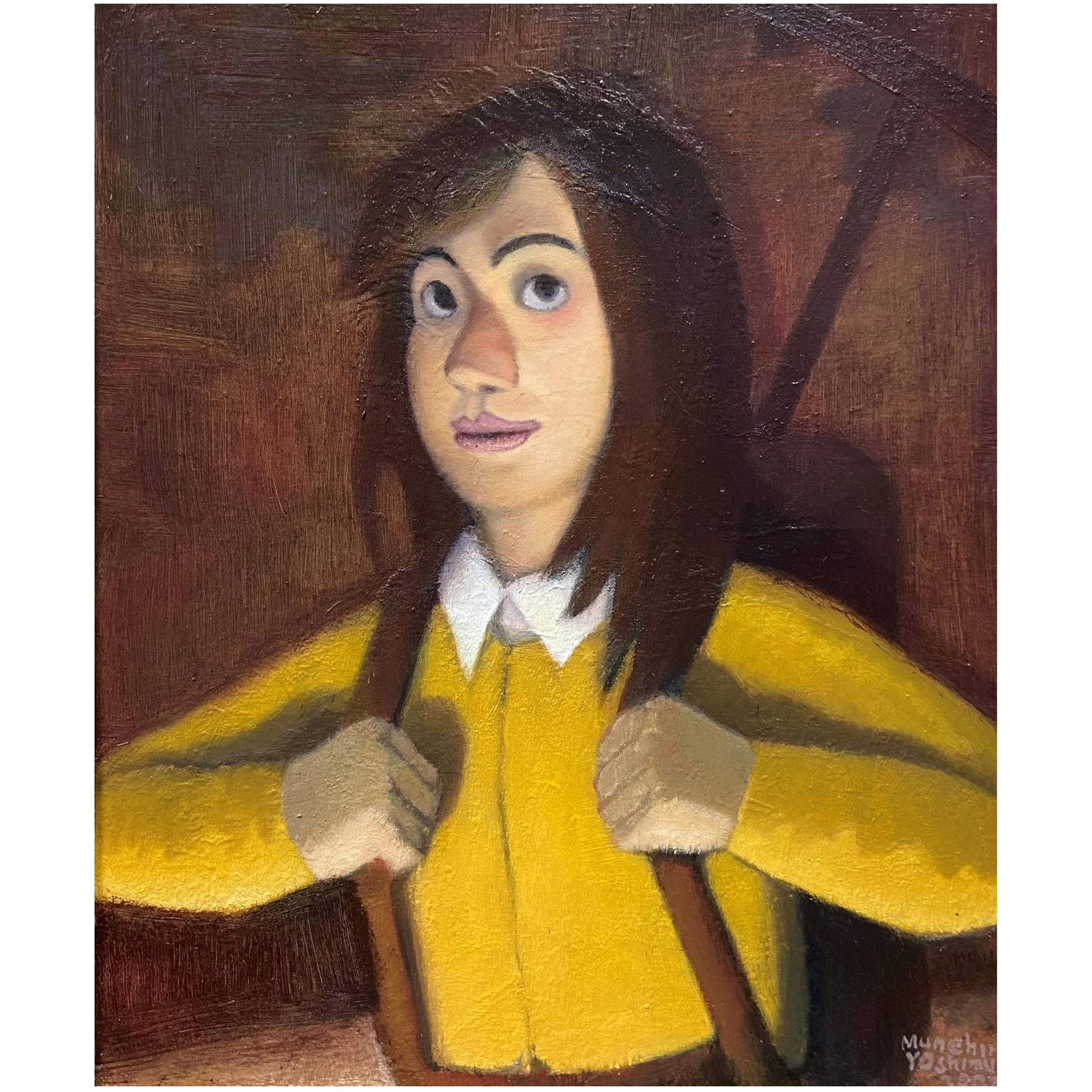 黄色いセーターの女性登山家