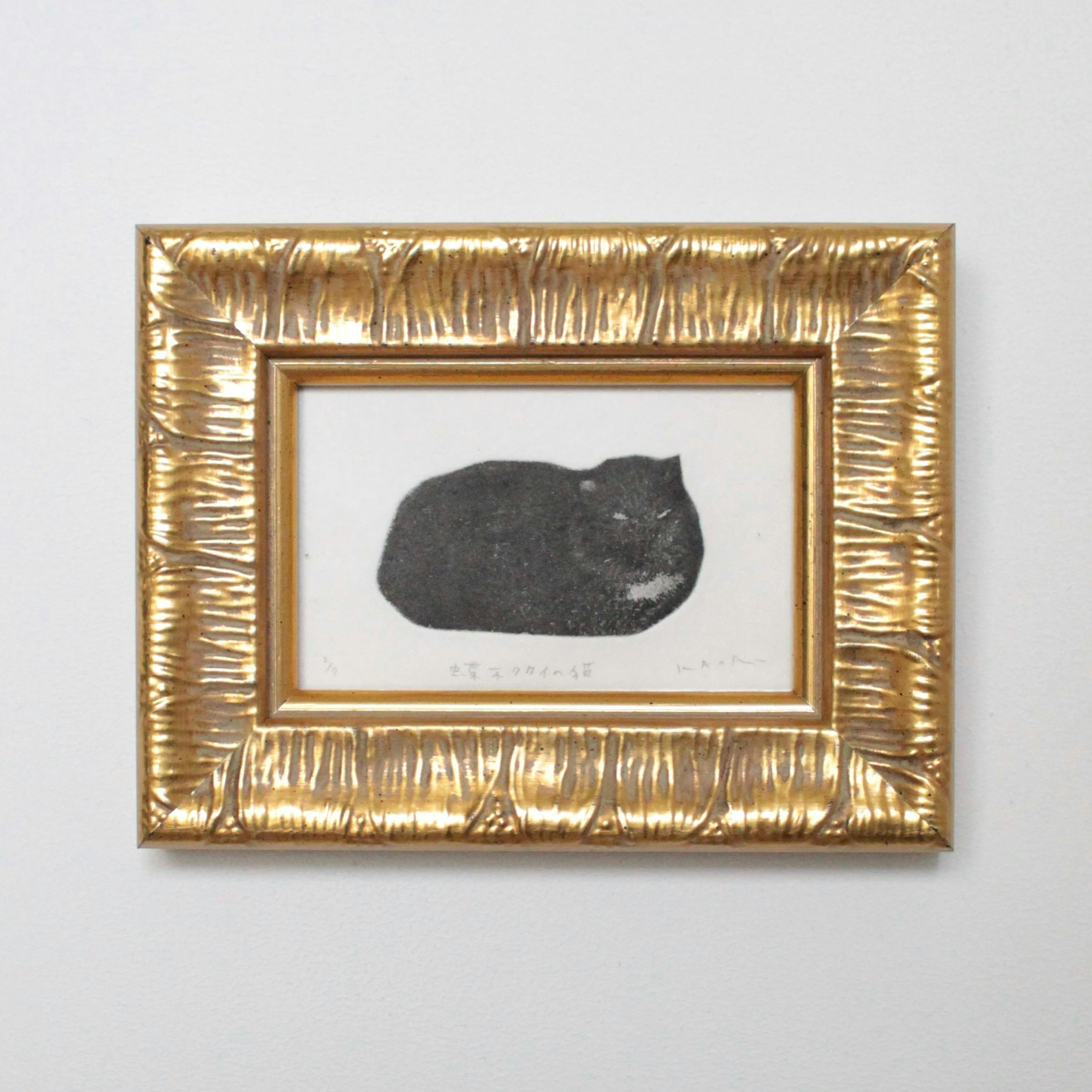 蝶ネクタイの猫