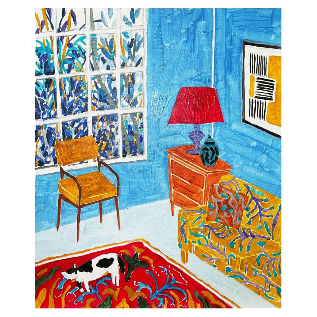 赤いランプとラグのある水色の部屋