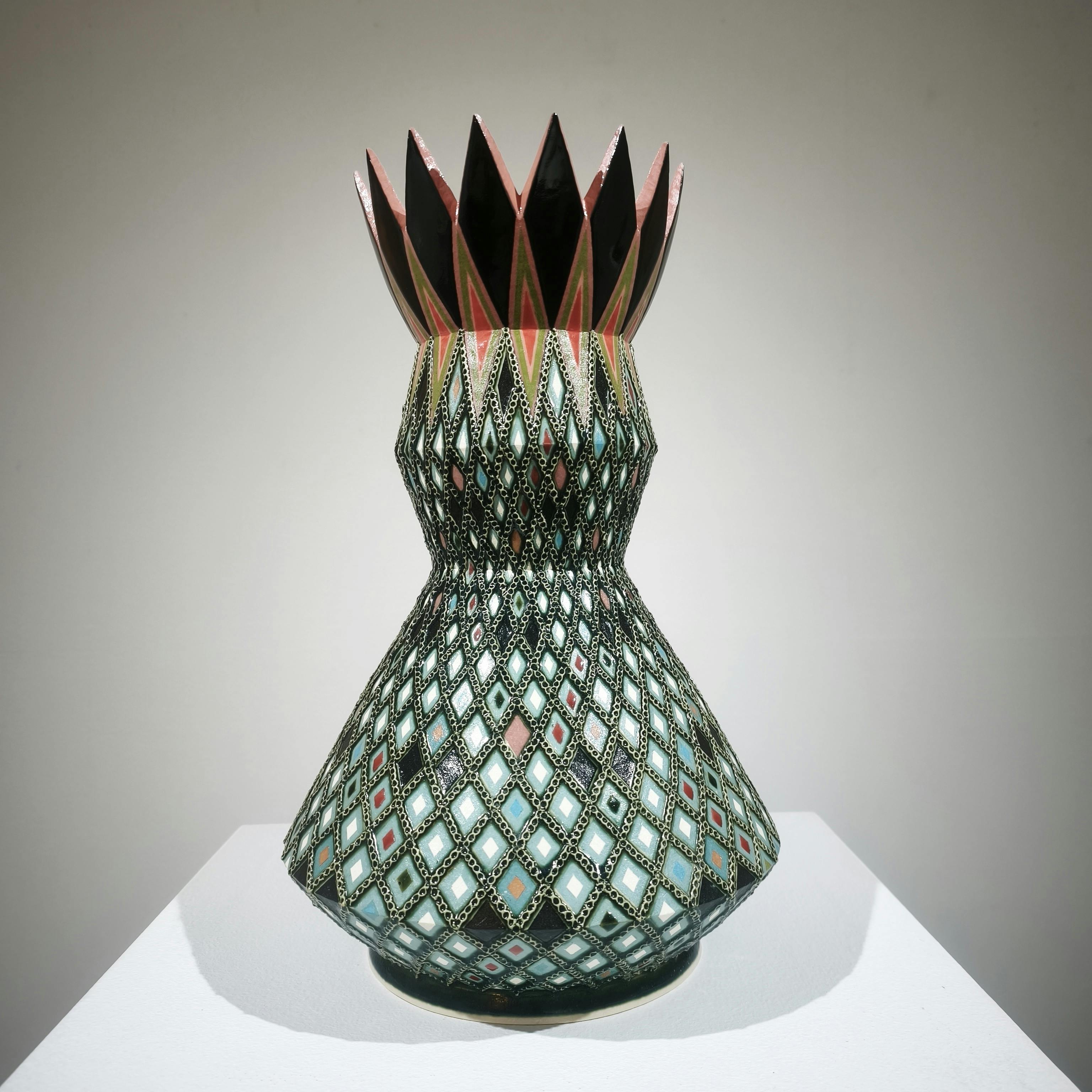 象嵌彩色縄目緑釉壺