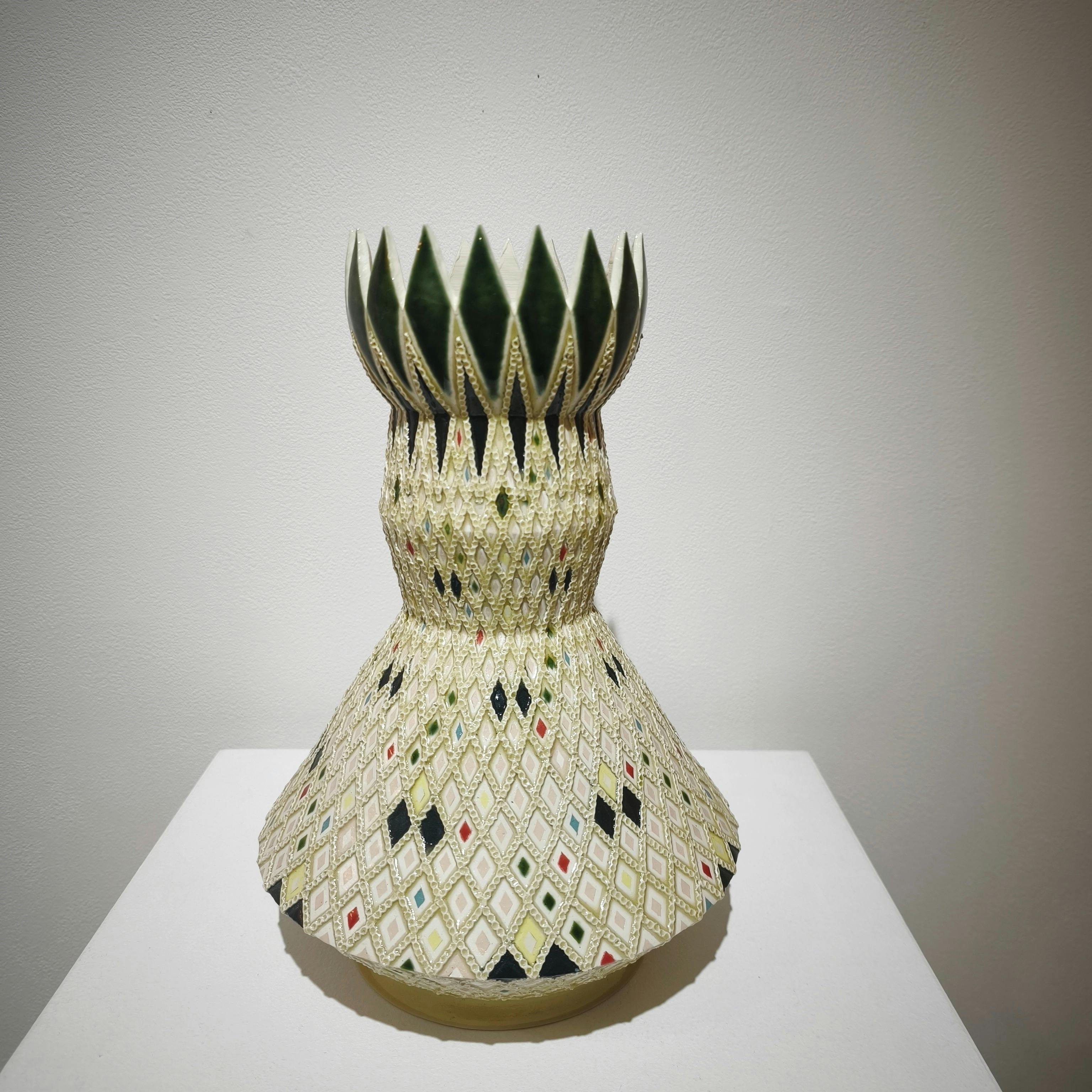 象嵌彩色縄目白地壺