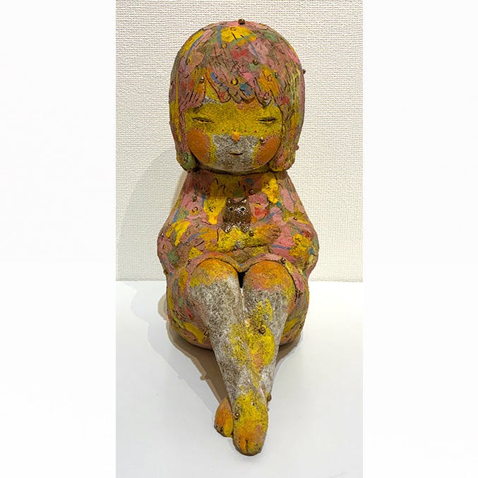 金のねこ　だっこ