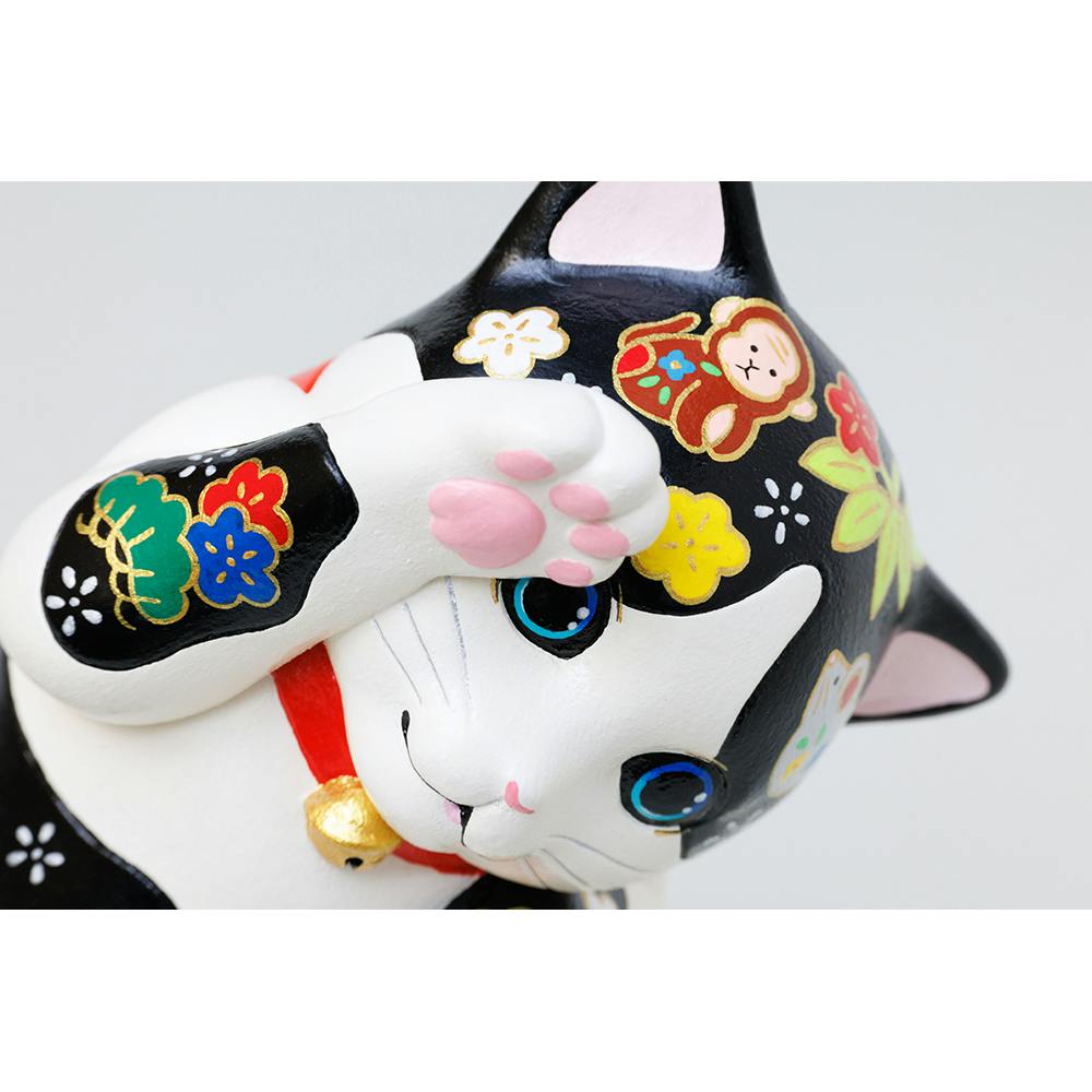 MANEKUNEKO（en）