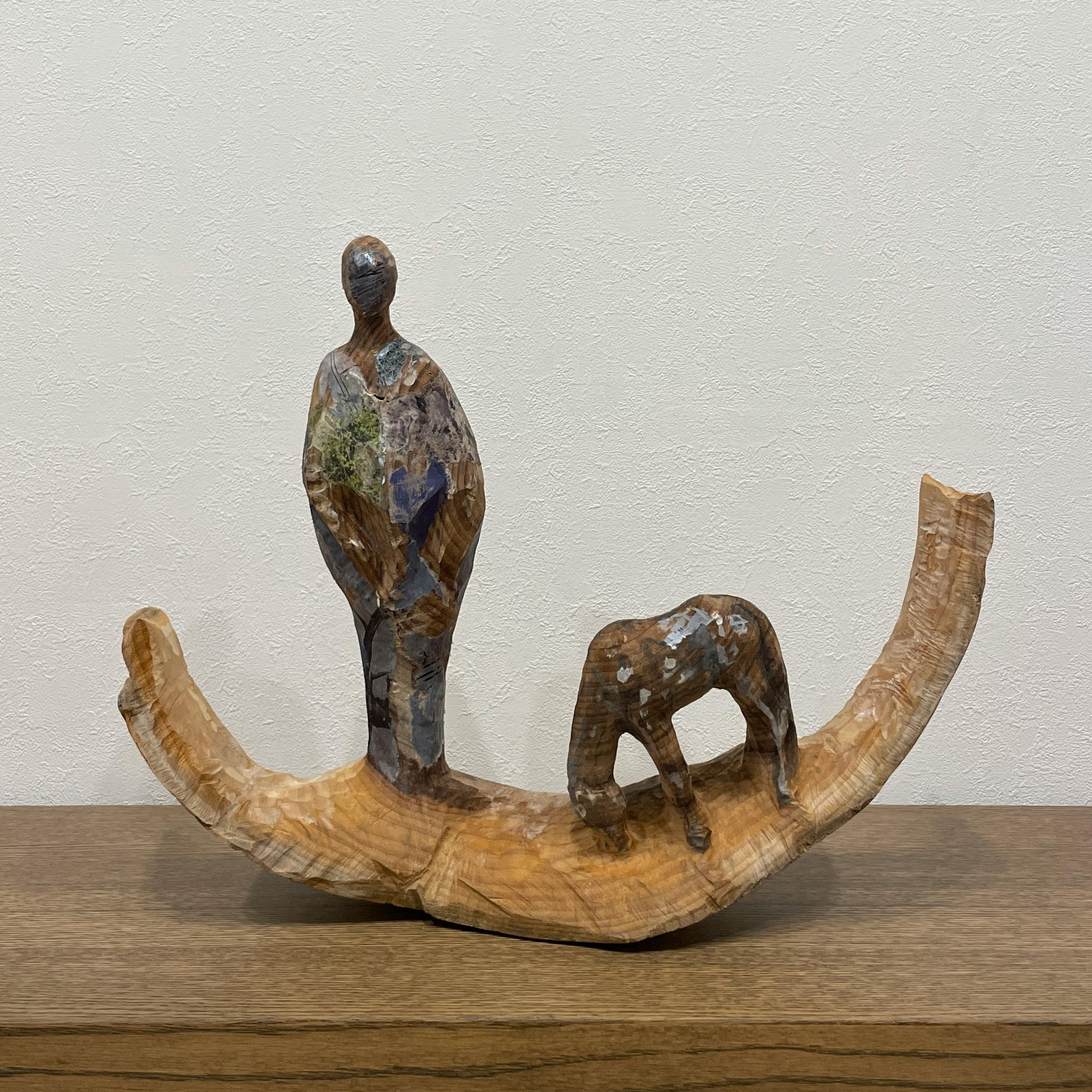 Contours lointains, homme et cheval
