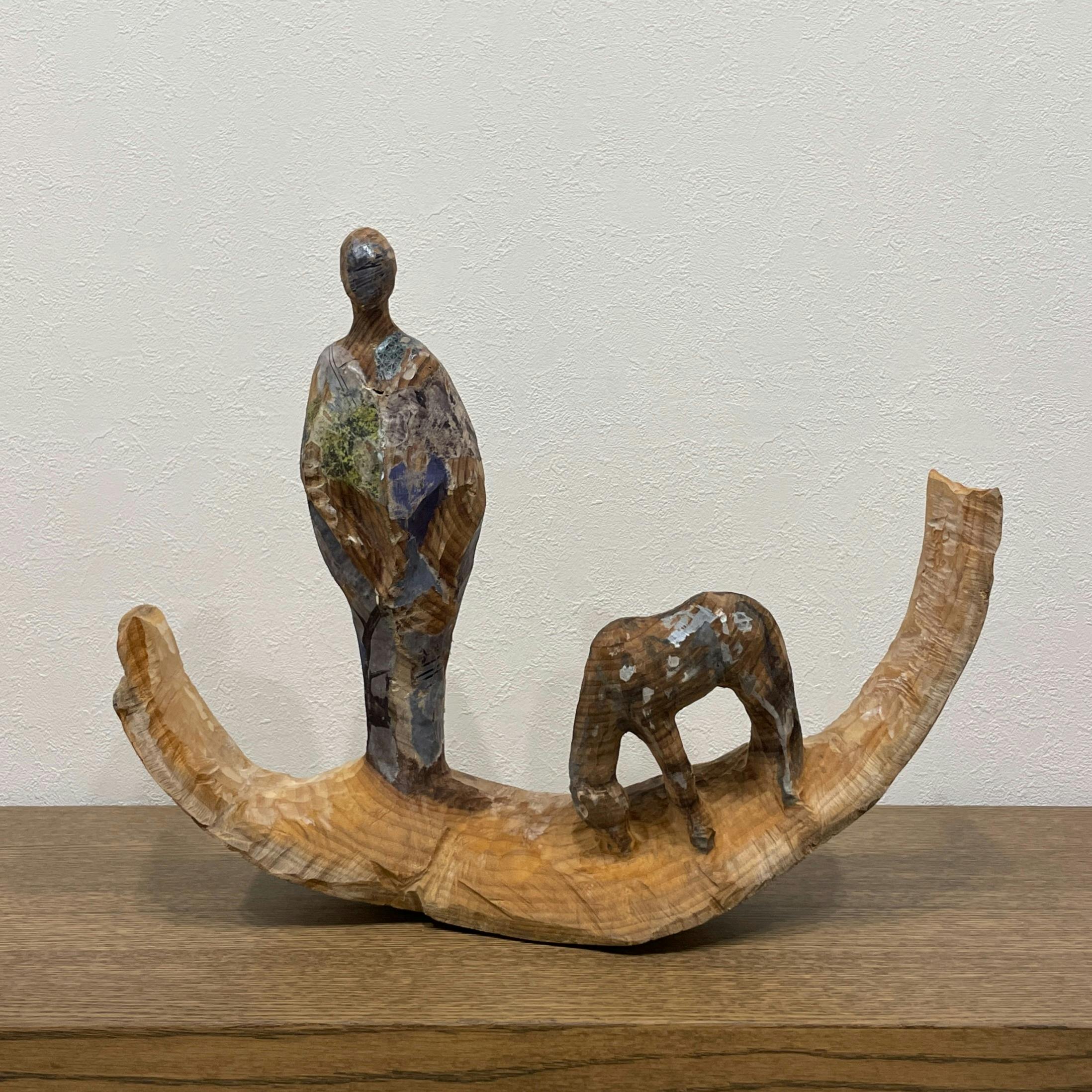 Contours lointains, homme et cheval